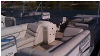 a view of the interior on a 22 foot pontoon showing the front seating.